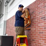 Smiling mover from local moving company near me — Huntington Beach