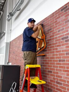 Smiling mover from local moving company near me — Huntington Beach