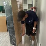 Best movers organizing office furniture for a professional long-distance relocation in Huntington Beach