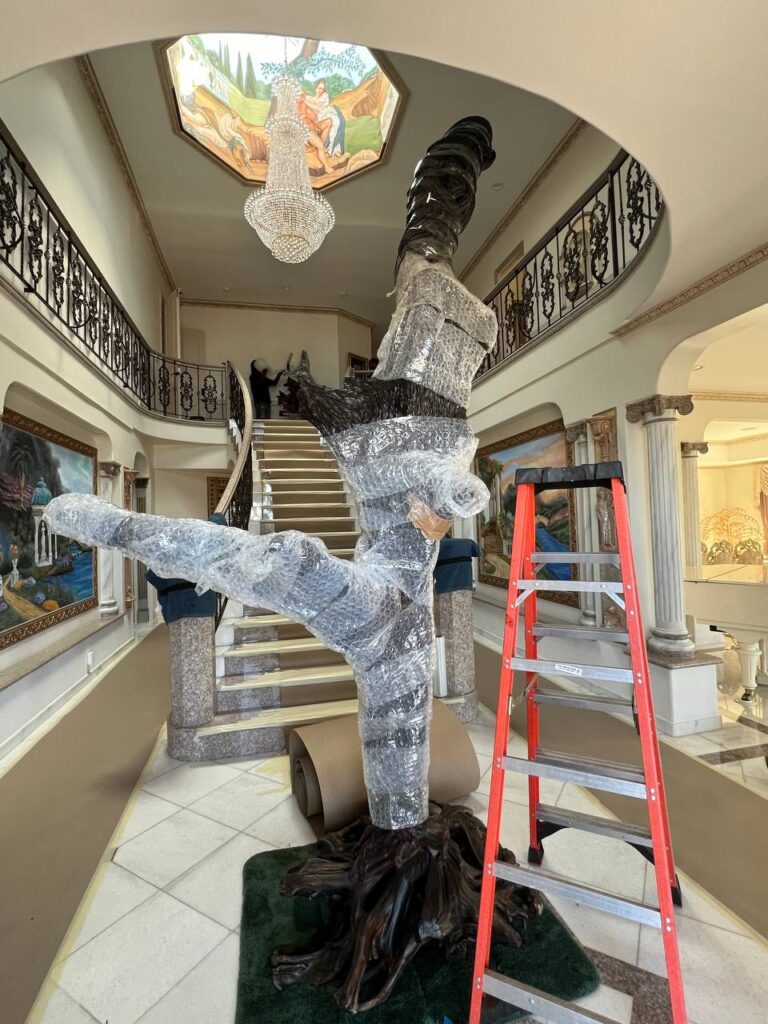 white glove movers handling antique furniture in OC