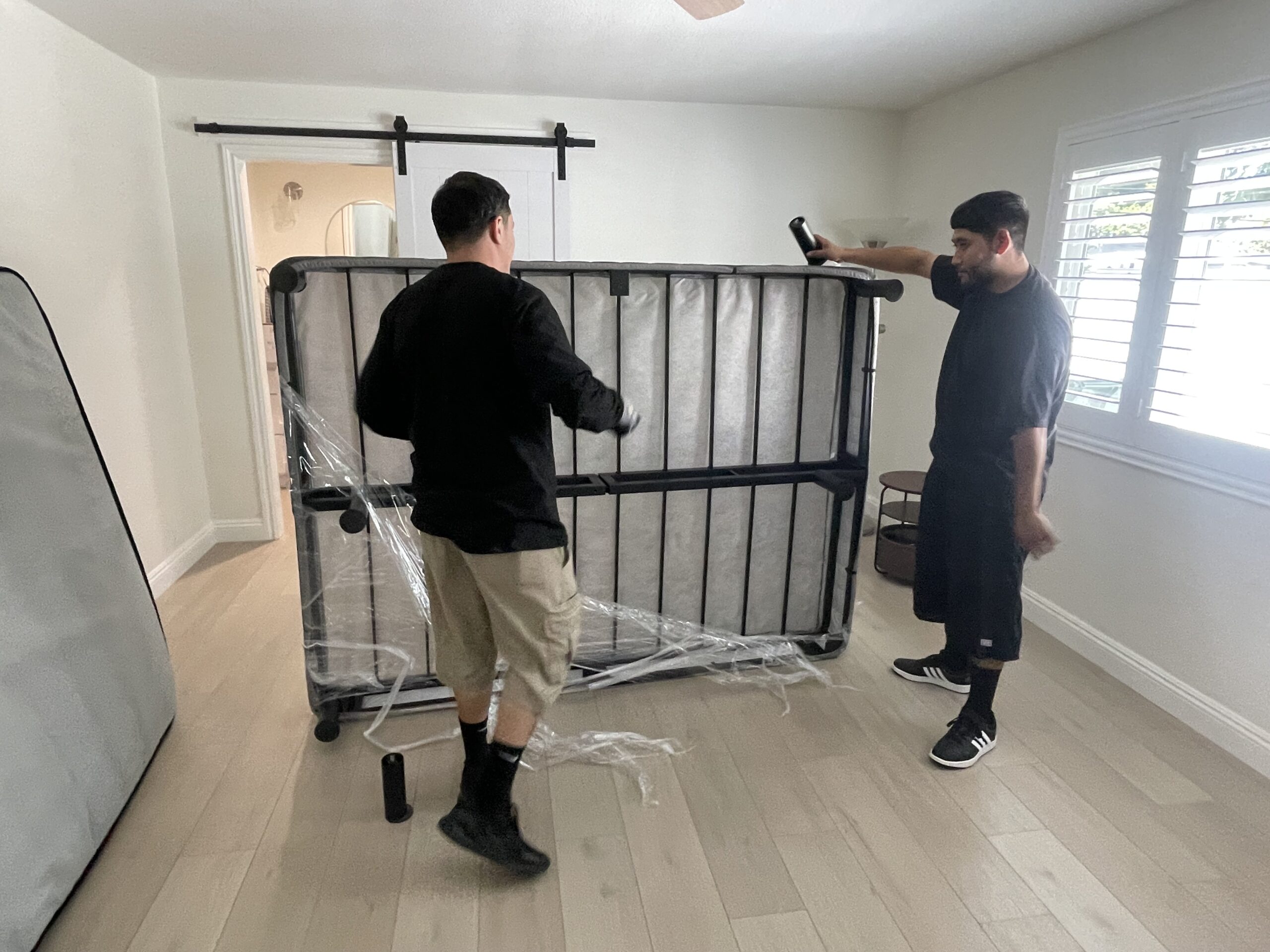 OC Movers team loading furniture for out-of-state relocation