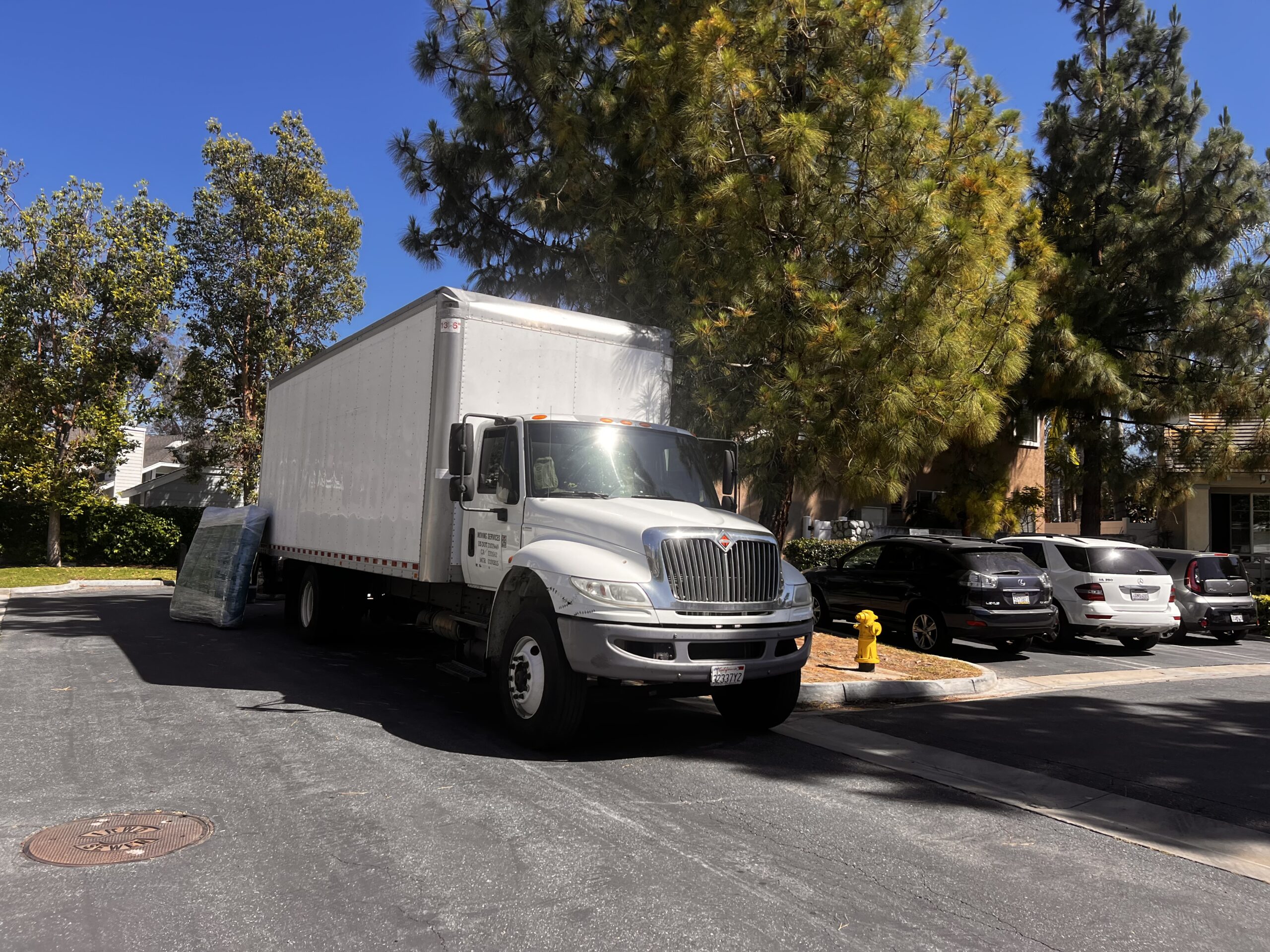 OC Movers truck in Santa Ana residential neighborhood