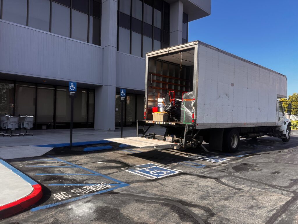 Loading a wardrobe into a moving truck in Orange County
