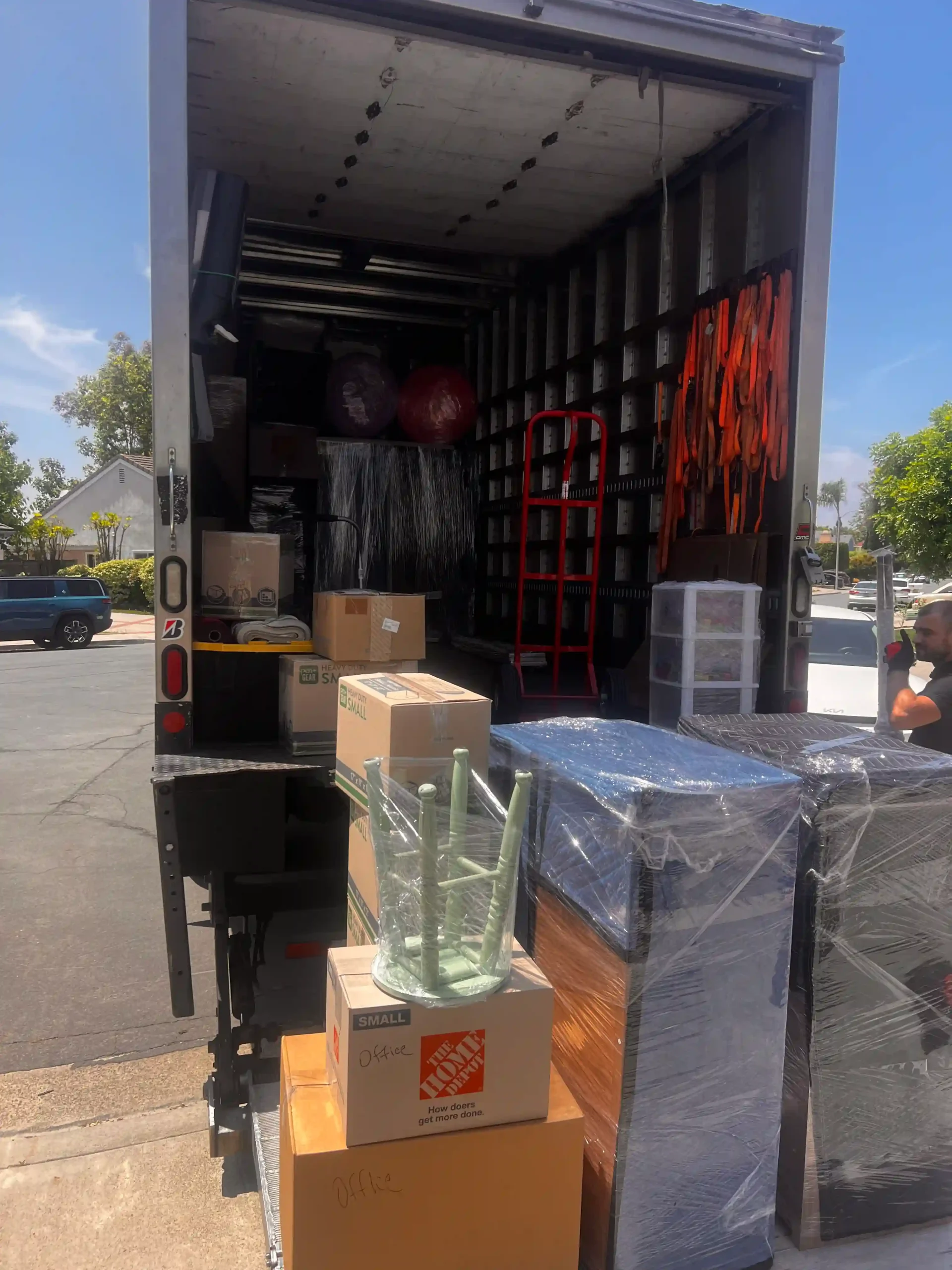 OC Movers truck outside commercial building in Anaheim