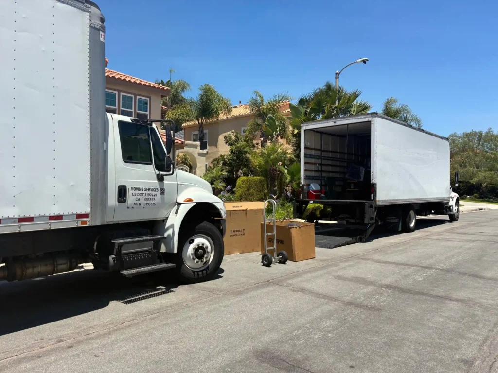 Local movers loading furniture into truck in Orange County
