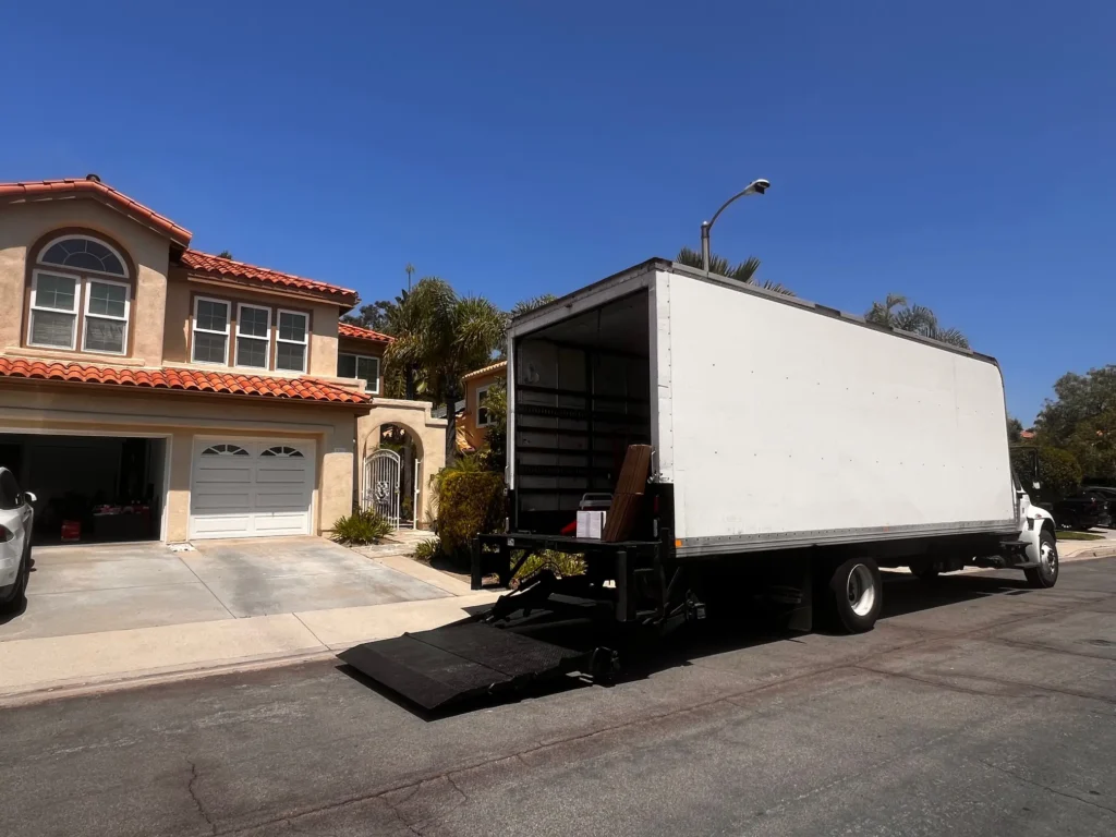 Residential movers loading furniture into truck in Orange County