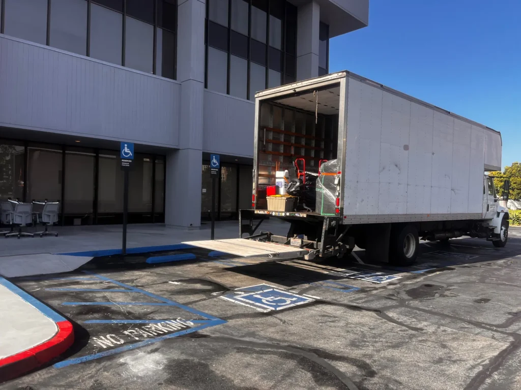 Loading a wardrobe into a moving truck in Orange County