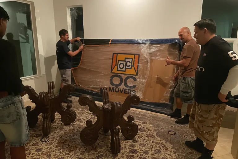 Professional movers in Garden Grove carrying boxes