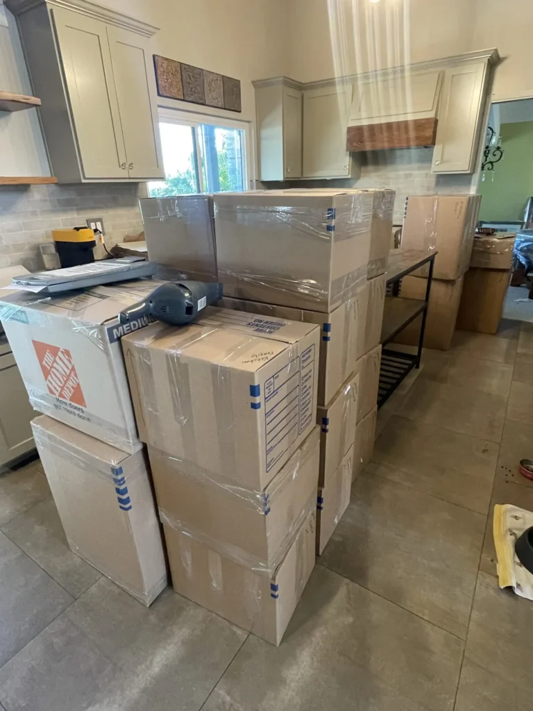 Professional packers from OC-Movers packing household items in Orange County